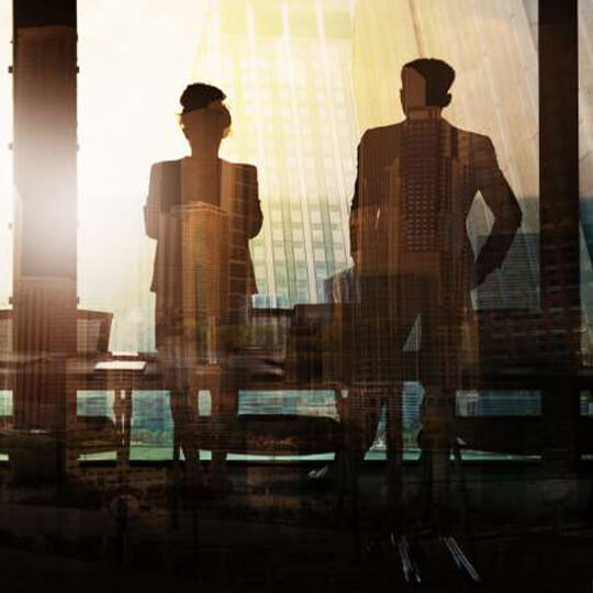 odgers berndtson - colleagues speaking within a board room setting