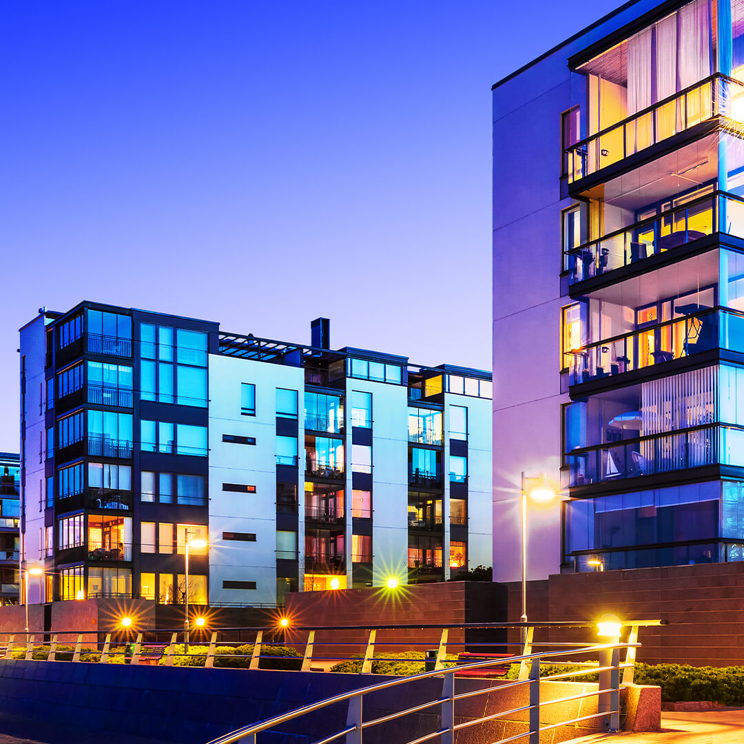 odgers berndtson - housing estate lit up during dusk